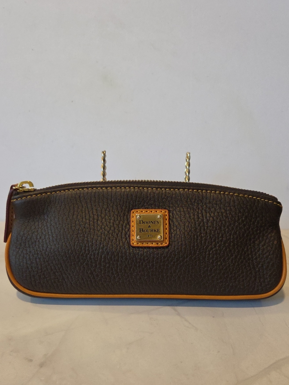 Dooney & Bourke Brown Pebbled Leather Pouch with Tan Accent